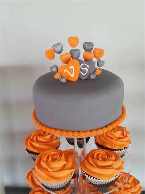 top tier red velvet orange and grey theme cupcake