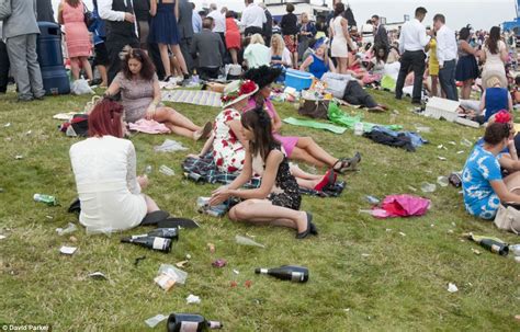 hold onto those hats drunken racegoers feel the effects of a champagne