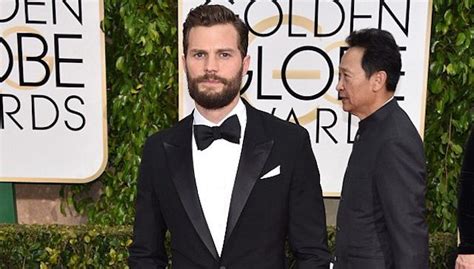 warning jamie dornan has shaved all his hair off and looks very different now stellar