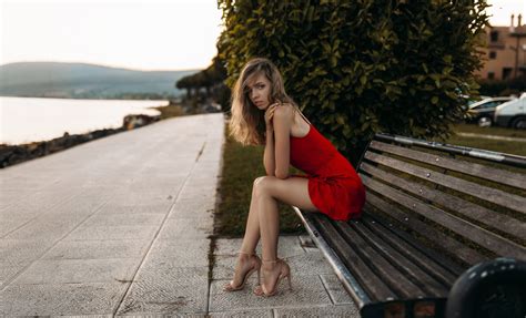 model sitting on bench in red dress wallpaper hd girls wallpapers 4k