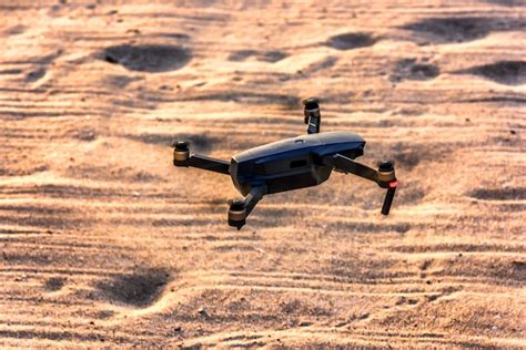 premium photo drone flying  san beach  sunrise