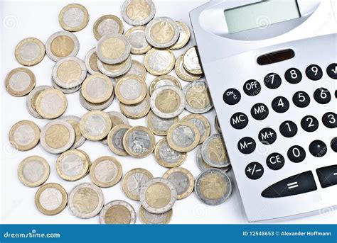 calculator  euro coins stock image image  isolated