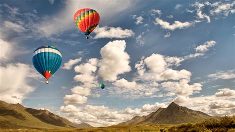 colorful hot air balloon flight sky clouds wallpaper
