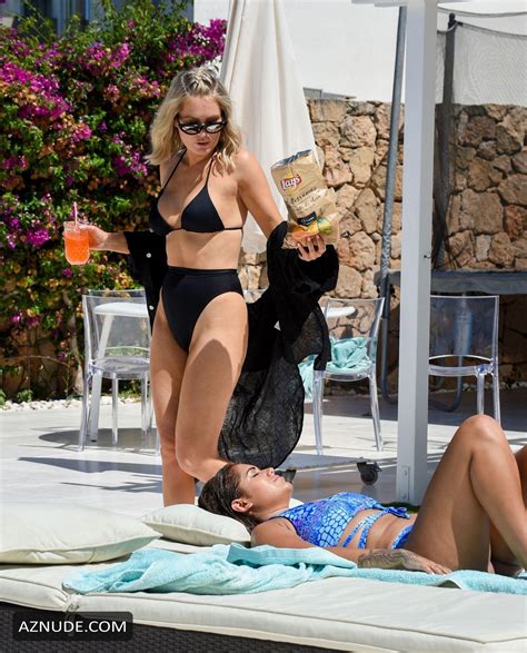 malin andersson and keira maguire are spotted frolicking by the poolside on their holiday