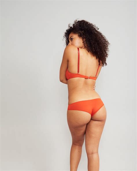 jessica simpson models racy red bikini as she has a ball