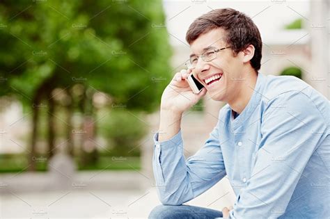 guy talking  mobile phone featuring cell phone cheerful  college
