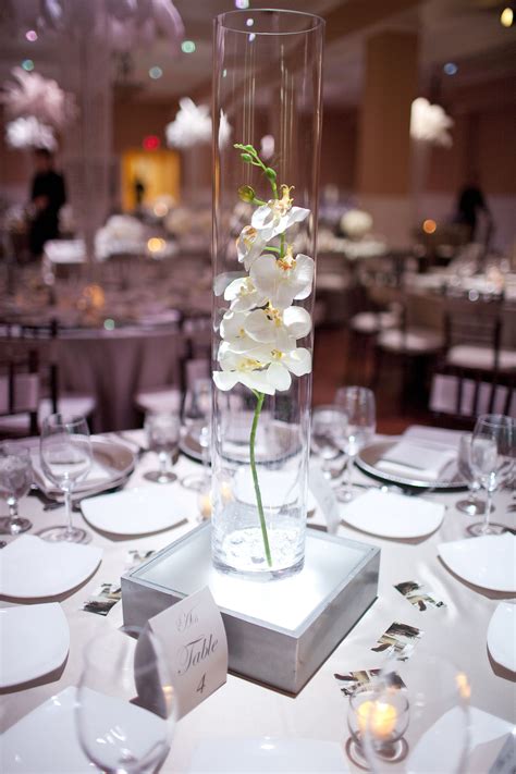 Orchid Centerpiece In Glass Cylinder Simple And Beautiful