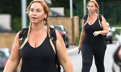 Josie Gibson Displays Her Sizzling Curves In A Plunging Lycra Bodysuit