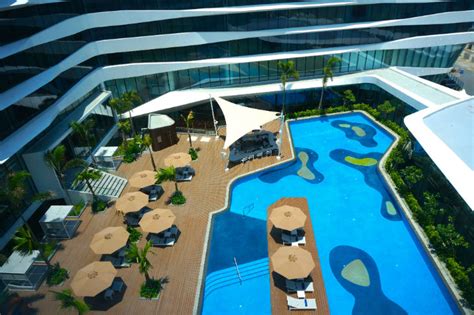 conrad hotel opens  manila abs cbn news