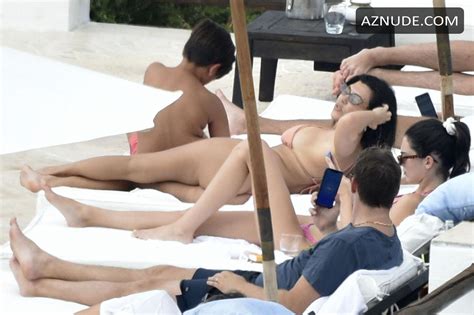 Kourtney Kardashian Showing Off Her Figures By The Pool With Kendall