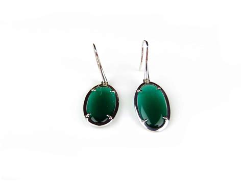 koop zilveren oorringen oorbellen model oval groene stenen van de designer