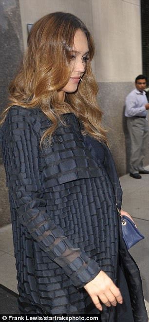 pregnant jessica alba covers bump in new york daily mail online