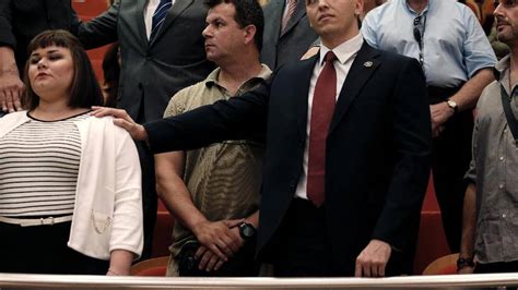 under police escort greek extreme right politician takes seat on