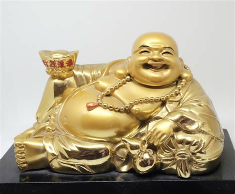 attract wealth  feng shui   laughing buddha