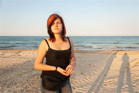 Young Attractive Woman Standing At The Beach Worried Facial Expression