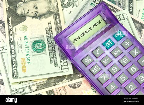 calculator dollar bills  gross domestic product  america stock photo alamy