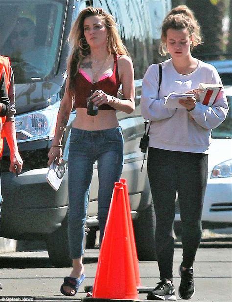 Amber Heard Bares Her Svelte Midriff As She Films Run Away With Me