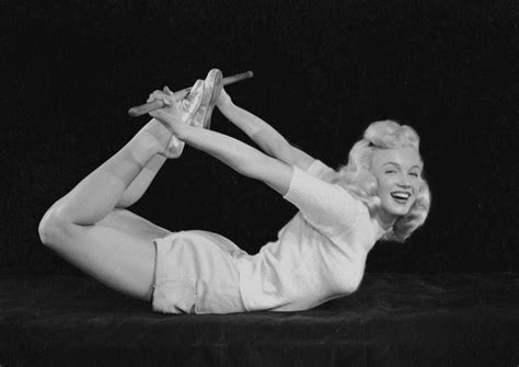 rare vintage photographs of marilyn monroe doing yoga in
