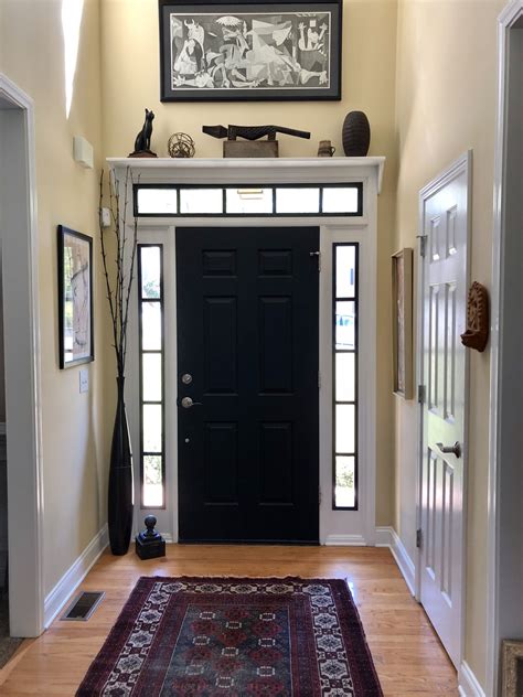 entryway   black door  rug   floor  front