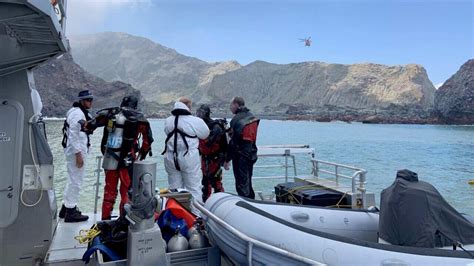 difficult  ongoing task nz police  resume search  missing white island bodies sbs