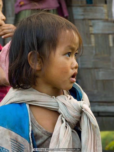 photo of small girl people and villages xieng khouang laos