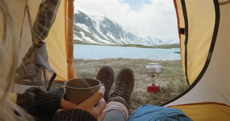 Camping Woman Lying In Tent Close Up Of Girl Feet Wearing Hiking Boots