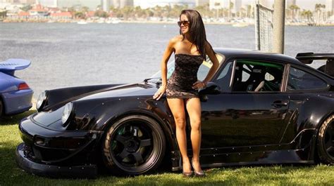 ladies posing with cars can we if we don t get overboard the