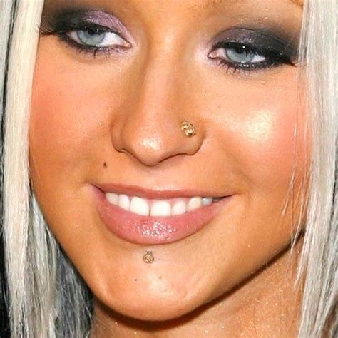 Christina Aguilera’s Piercings Body Art Guru