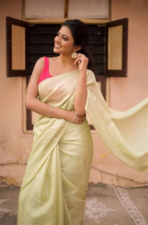 kayal anandhi elegant sleeveless saree pics