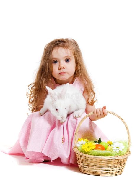 kid holding easter bunny stock photo image  giggle