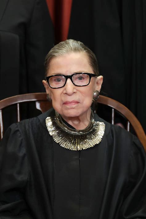 notorious rbg poses for scotus portrait in signature necklace also worn