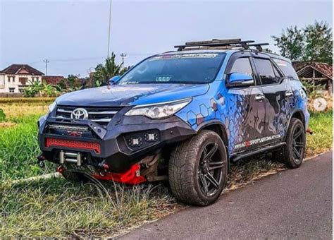 check   fantastic red bull livery   modified toyota fortuner