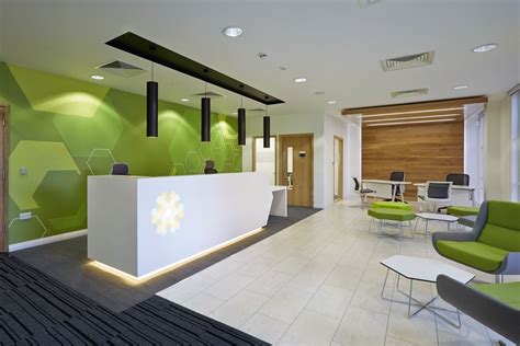 reception area  green wall clinic interior design hospital interior design healthcare