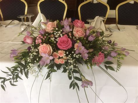 a pink and mauve top table arrangement table arrangements table