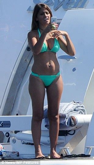 lionel messi s partner antonella roccuzzo shows off her curves in a mint bikini in ibiza daily