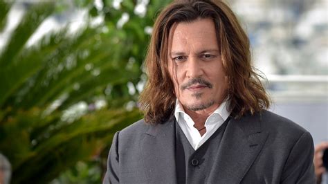 hero s welcome for johnny depp at cannes film festival was an ugly