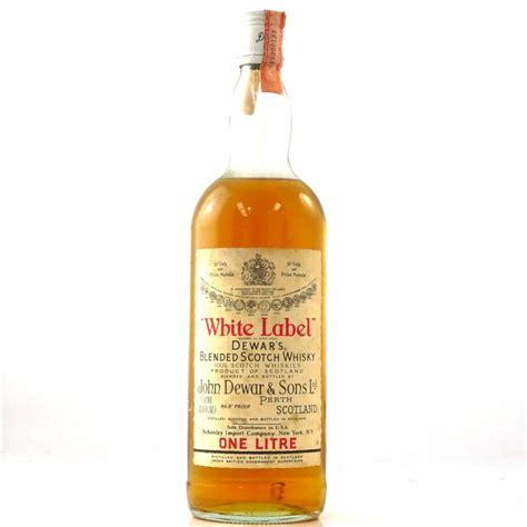dewars white label  litre   import whisky auctioneer
