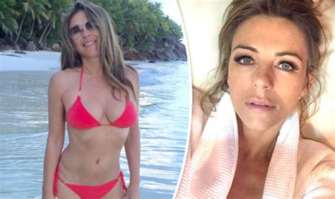 elizabeth hurley 52 exposes pert bottom as she strips totally naked in sultry throwback