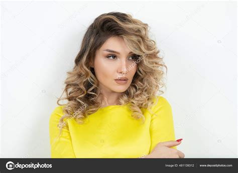 Blonde Curly Hair Woman Yellow Dress Looking Seductively High Quality