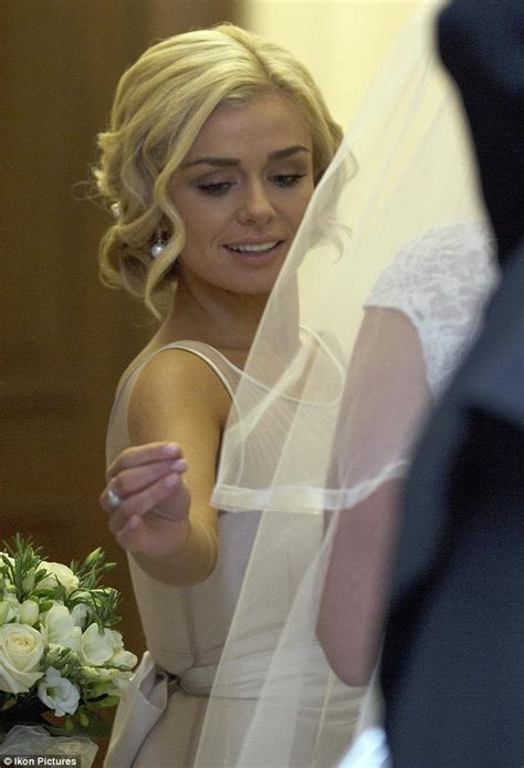 katherine jenkins risks upstaging her sister as she stuns in off white bridesmaid dress daily