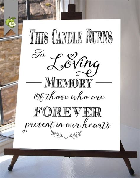 candle burns  loving memory wedding sign memorial