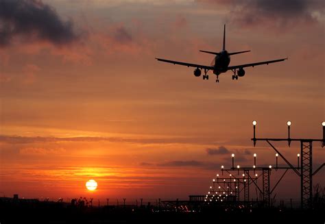 aeroplane landing   sunset  runway approach lights waterford