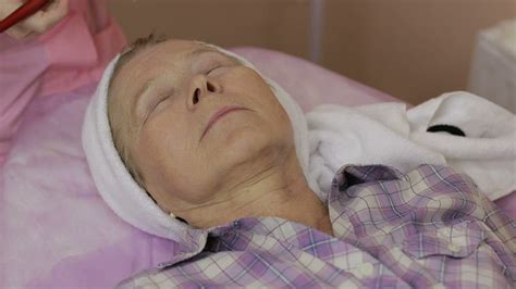 older woman   spa treatment  stock video
