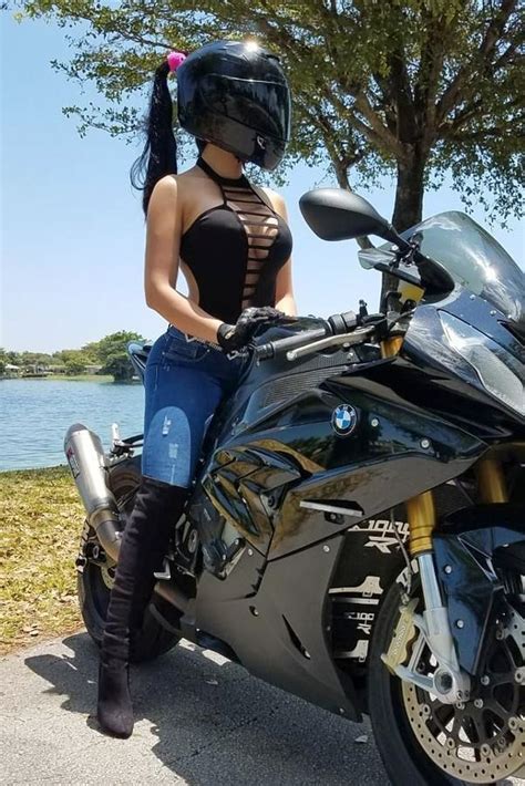 super hot biker girl in a cool black motorcycle helmet motorbike girl