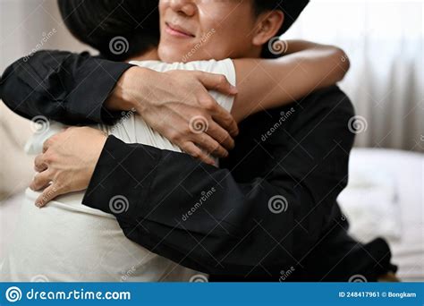 Asian Teen Gay Couple Hugging Cuddling Each Other In Bedroom Stock
