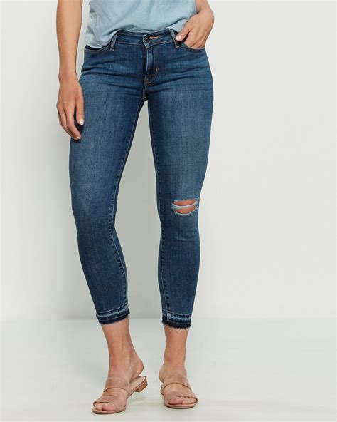 levi s denim 711 skinny ankle jeans in blue save 34 lyst