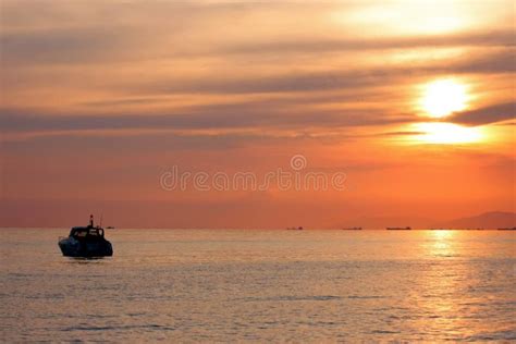 yacht  sunset stock photo image  ship nautical