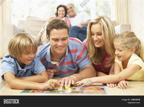 family playing board image photo  trial bigstock