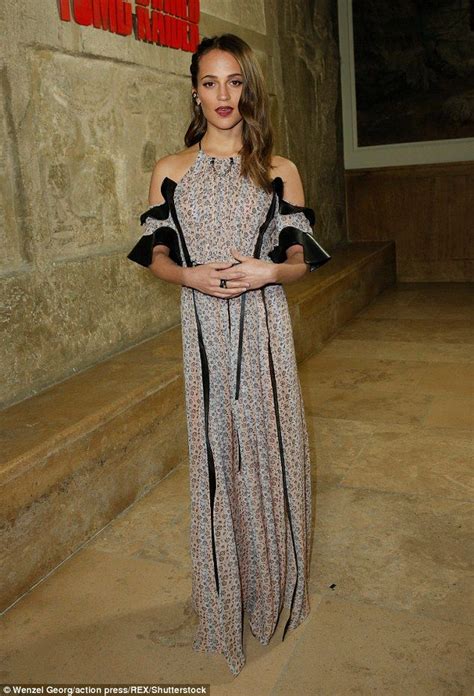 alicia vikander dazzles in an eye catching floral cold shoulder gown cold shoulder gown