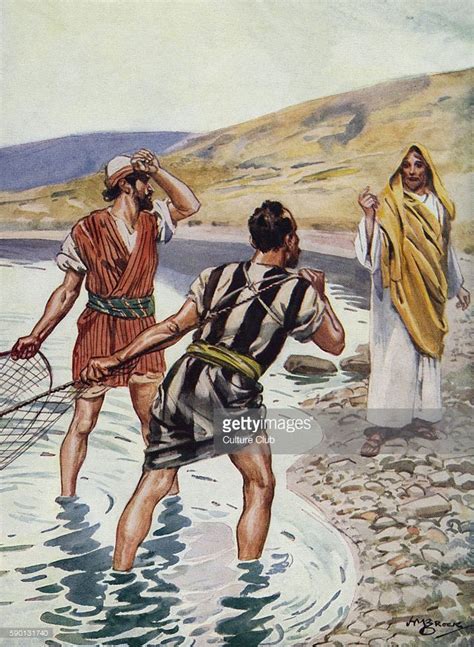 men  standing   water    holding  tennis racquet
